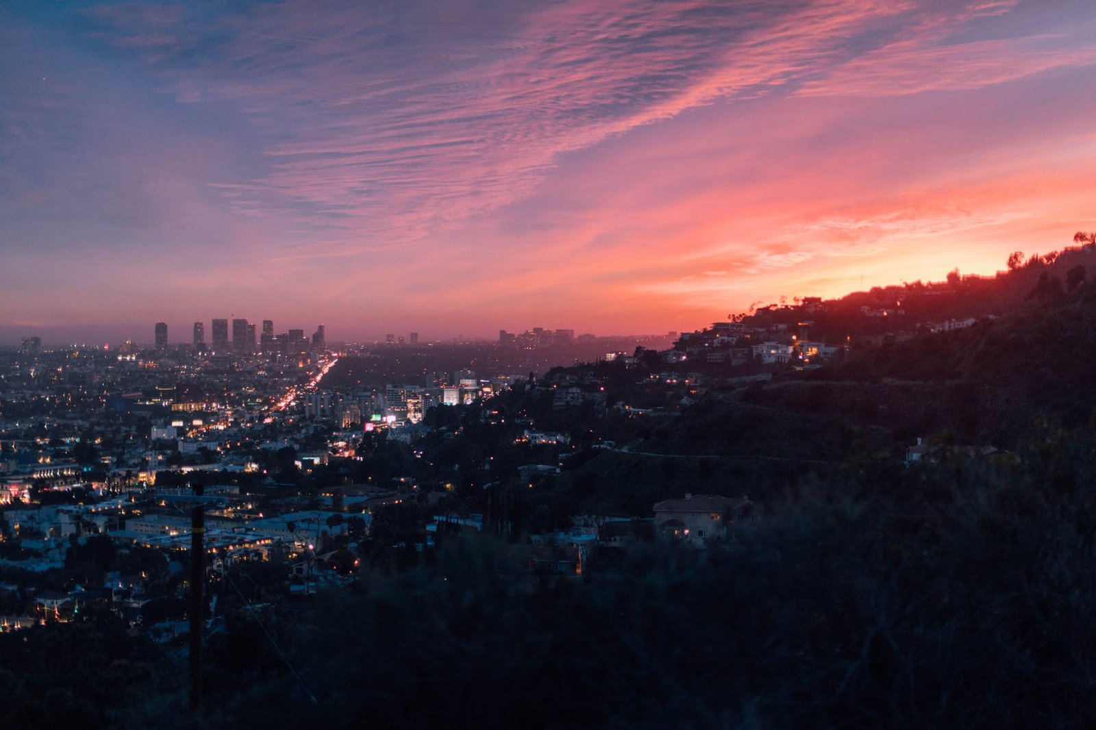 city near mountain during golden hour