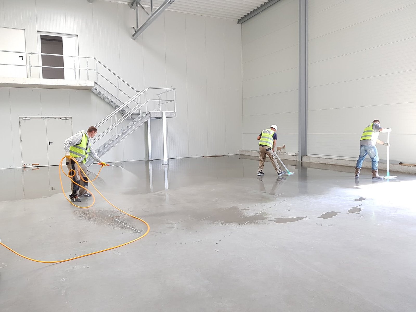 construction workers in safety reflective vests