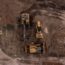 aerial photo of excavator road roller and bulldozer
